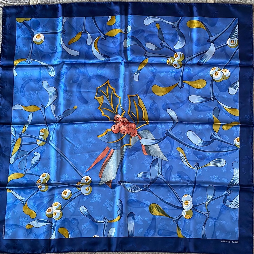 Hermes silk scarf with Christmas motif of holly branches.